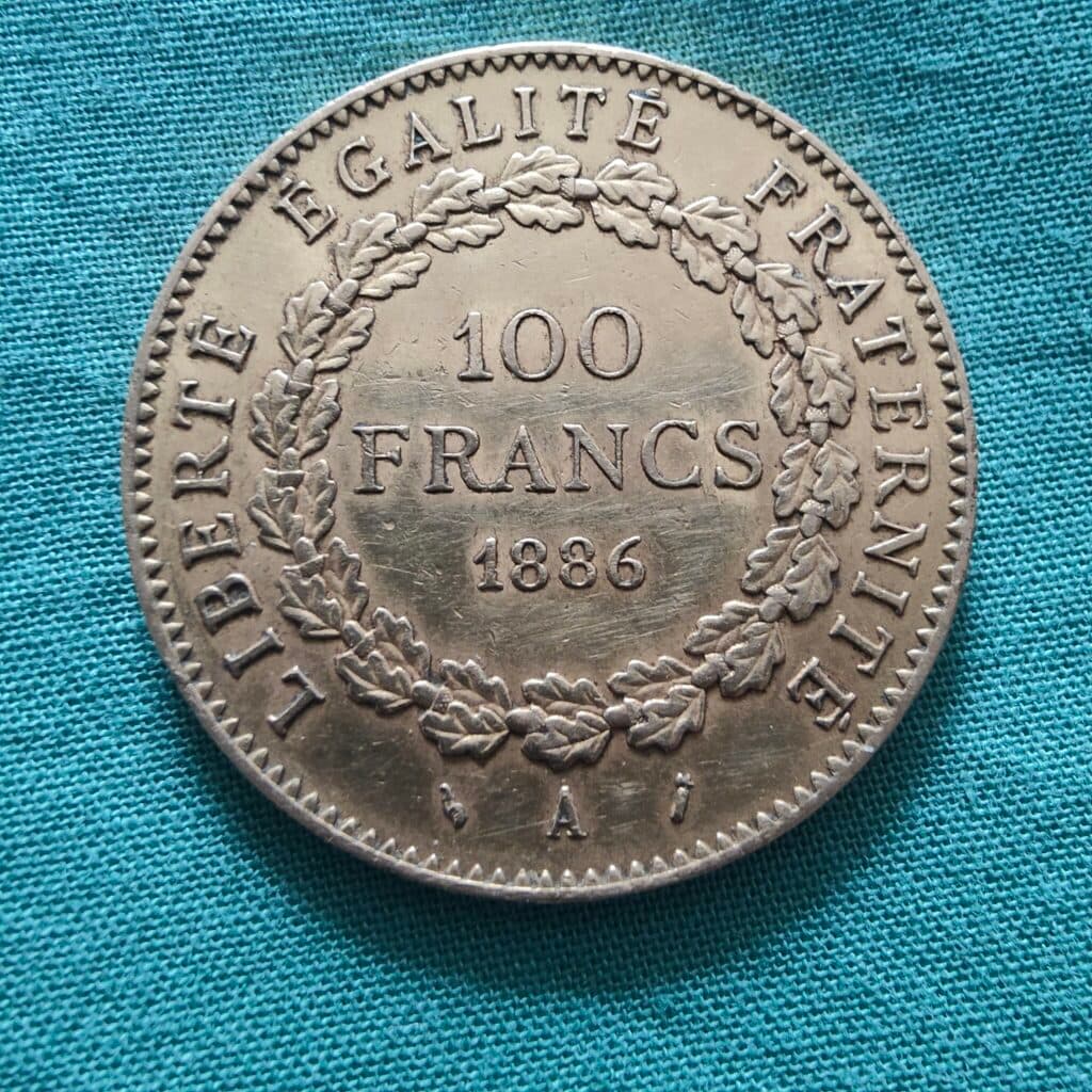 Estimation de la valeur d’une pièce de monnaie de 100 francs datant de l’année 1886