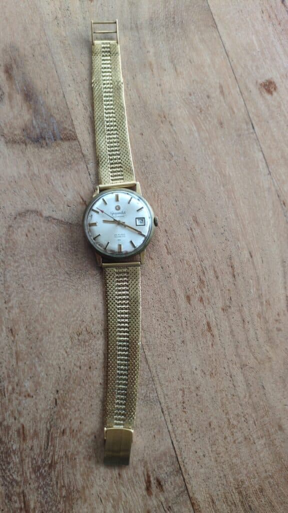 Estimation d’une Montre Gigandet en Or 18 Carats des Années 60 avec 25 Rubis en Etat de Fonctionnement