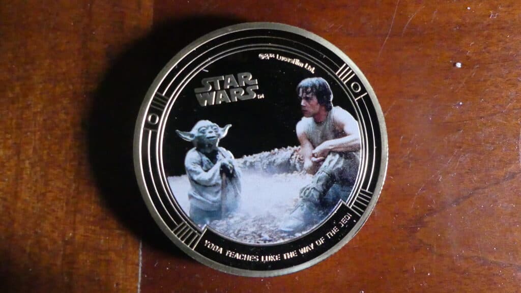 Estimation d’une collection de 13 pièces STAR WARS plaquées or Estimation d’une collection de 13 pièces STAR WARS plaquées or